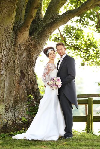 Brampton Grange Bride and groom under Tree.jpg